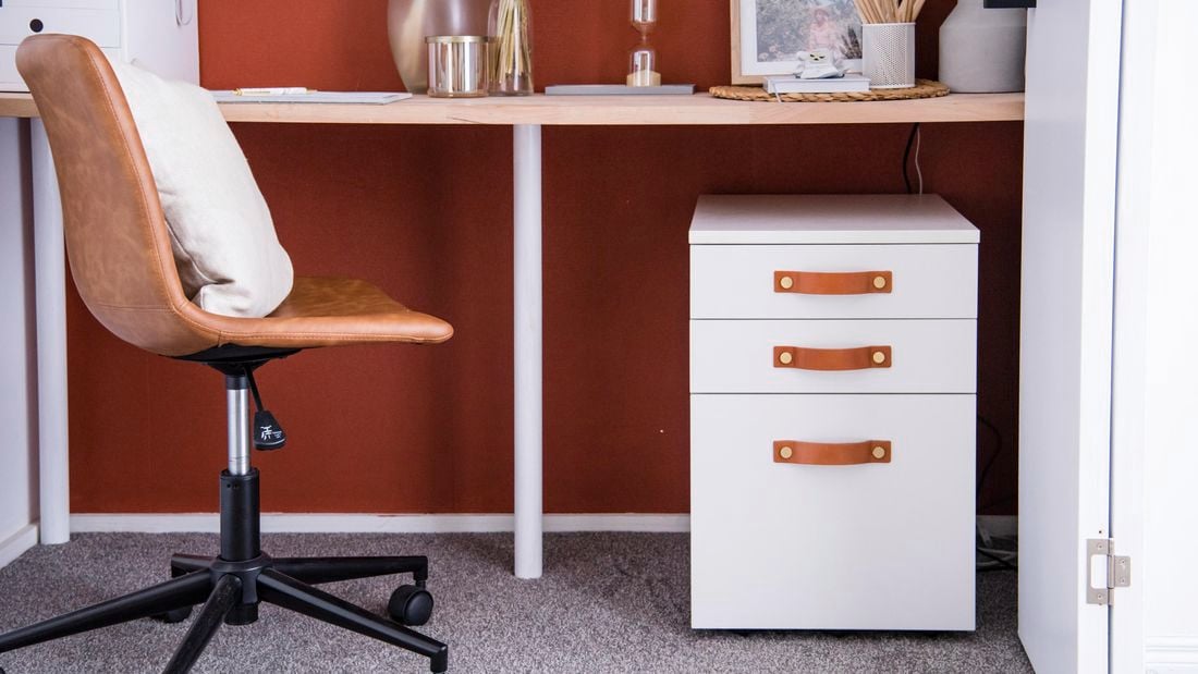 Home office with desk and chair.