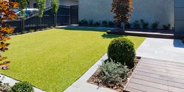 Backyard with synthetic turf.