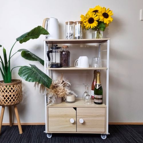 Beverage trolley with wheels.