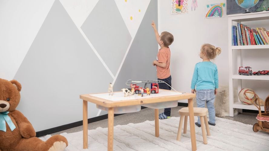 Feature wall created with the use of masking in kids play room. 