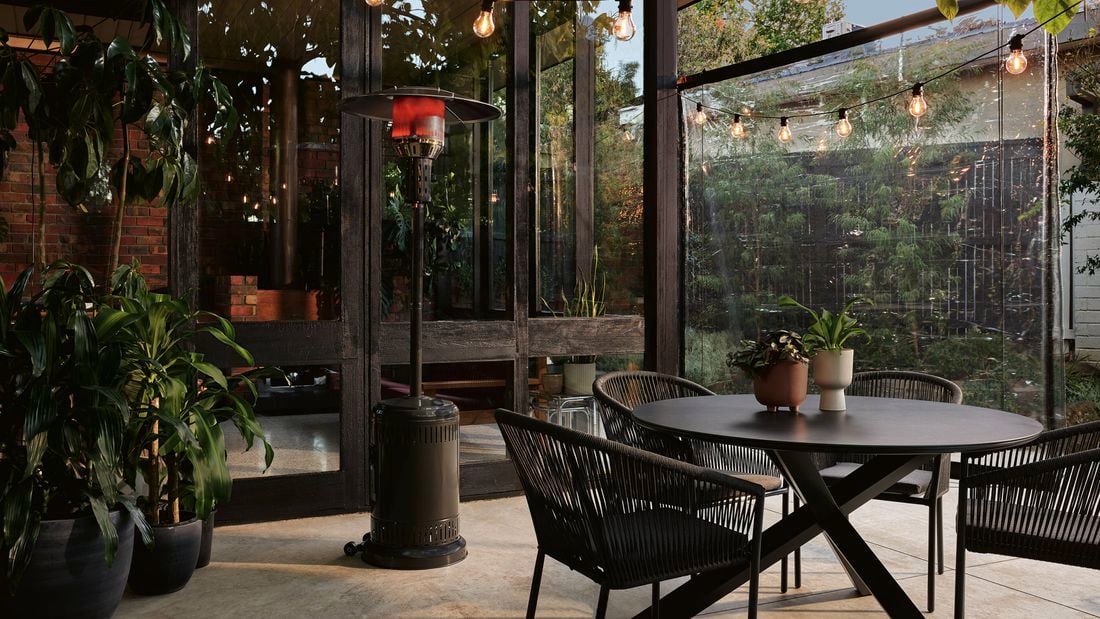A patio heater in an outdoor entertaining area.