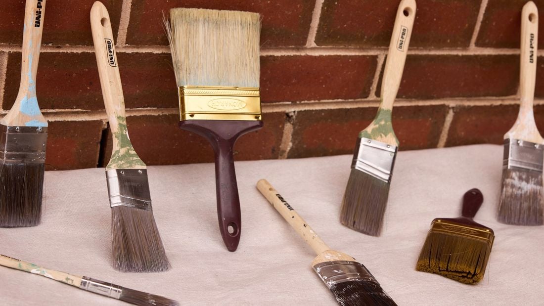Clean paint brushes of different sizes is set out to dry