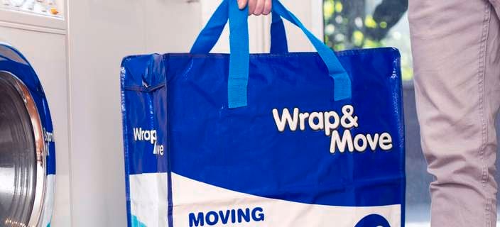 Blue and white wrap and move storage bag 70 litre.