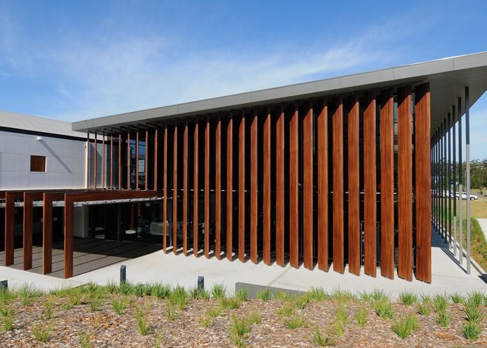 Artistic wooden slats along the side of a building