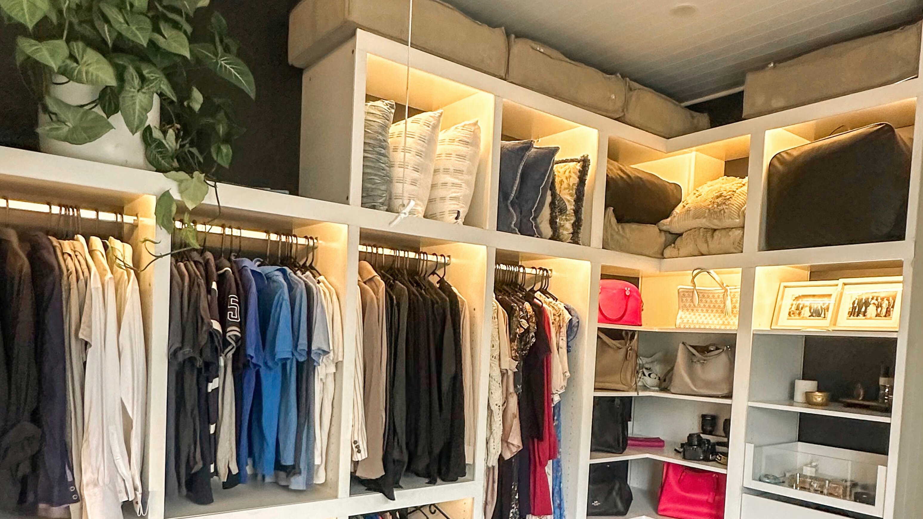 Flatpack custom wardrobe design in a bedroom with in built lighting 