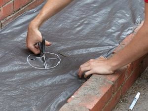 DIY Step Image - How to install weed matting . Blob storage upload.