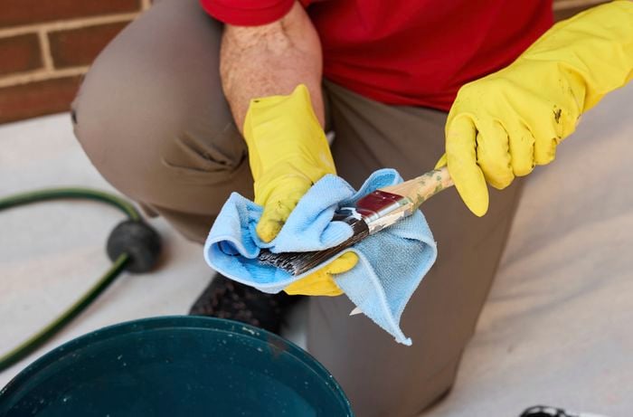 Dry and reshape the brush using a clean rag