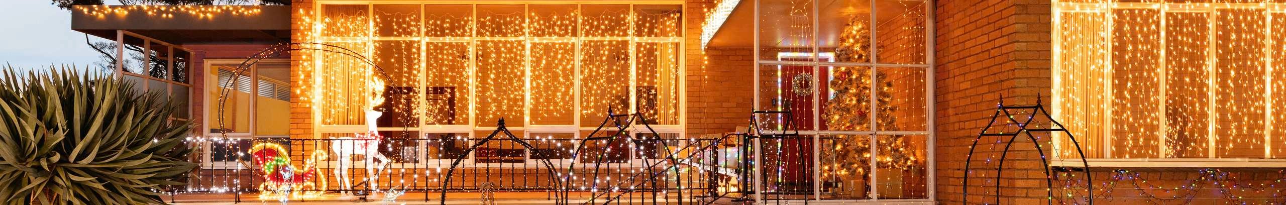 Festive lights at the front of a house.