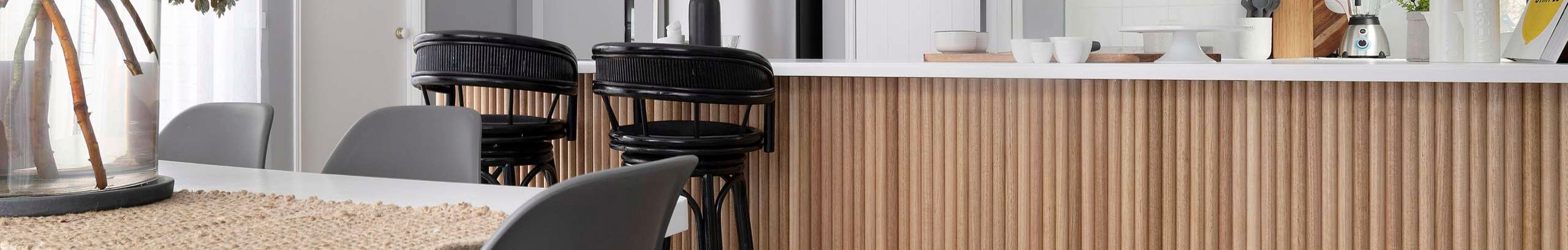 Kitchen with timber dowel cabinetry.