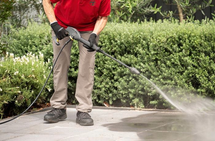 Wash and dry the pavers using a pressure washer