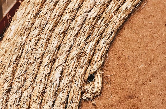 A rope placed on top of the MDF circle board as a coil.