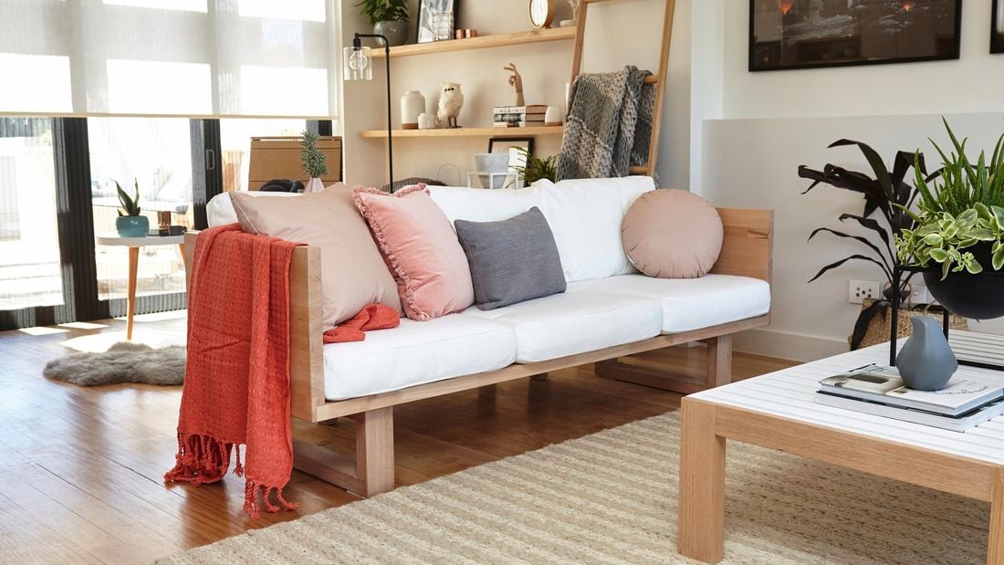 Lounge room with DIY modern timber sofa lounge.