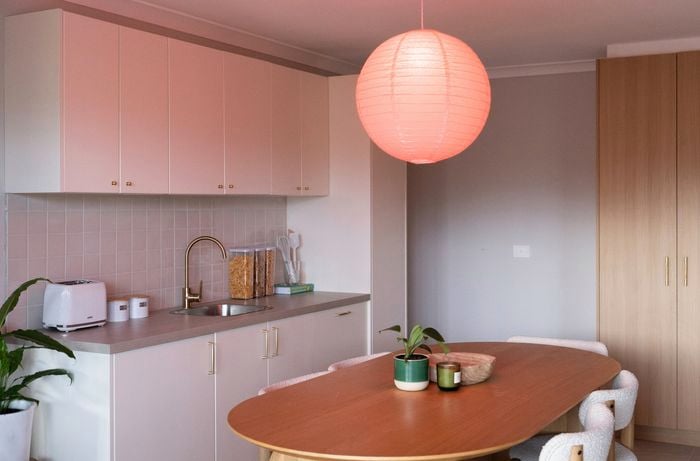 Paper hanging light shade assembled and ready for use with a rechargeable bulb.