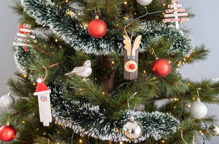 Christmas tree with decorations made from icy-pole sticks.