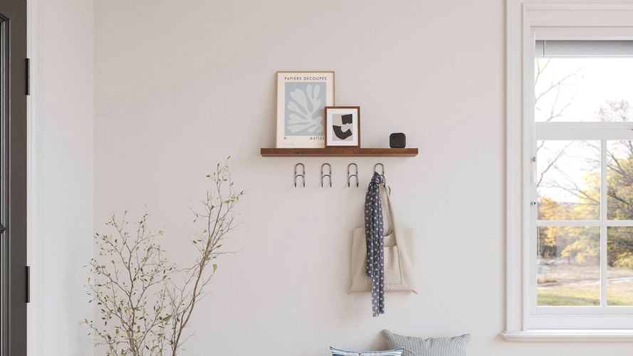 Smart camera on a shelf inside.
