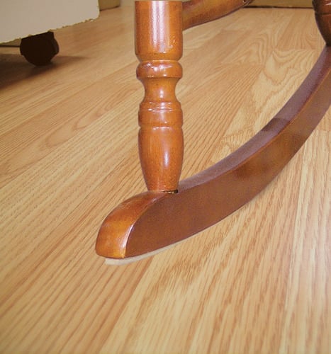 Rocking chair base with adhesive floor protection