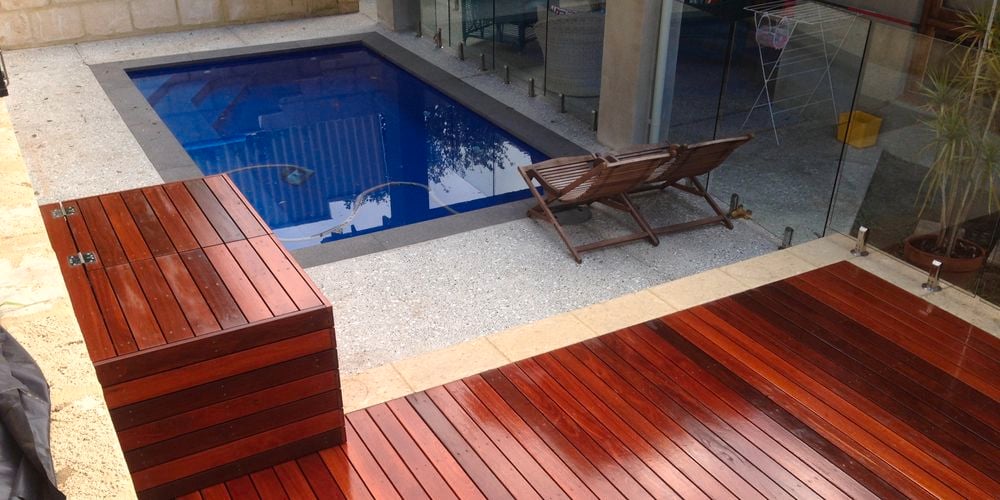 Jarrah
  deck beside a pool area.