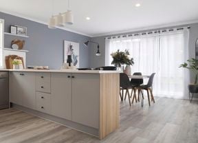 Renovated kitchen with a benchtop and painted laminate cabinets