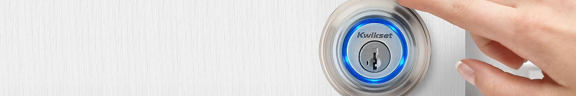 Kwikset digital lock with keyhole on door