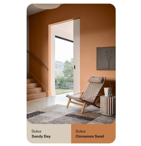 Dulux artboard with a stairwell, chair and window looking outside.
