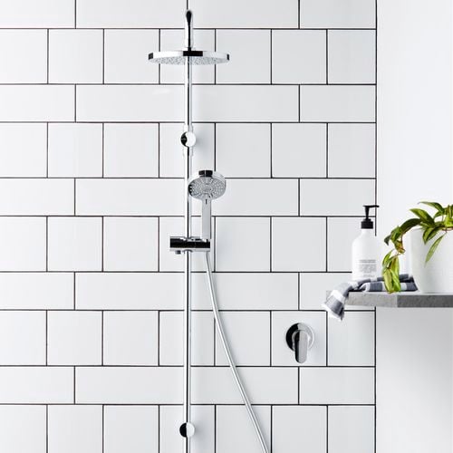 Chrome Krome twin shower system with white tiles