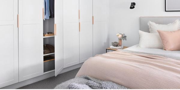 Bedroom with large wardrobe.