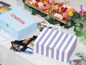 Decorated memory boxes featuring painted base colours, patterns and lettering to store photos, tickets and keepsakes.