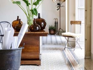 living room with focal points of vases and couch 