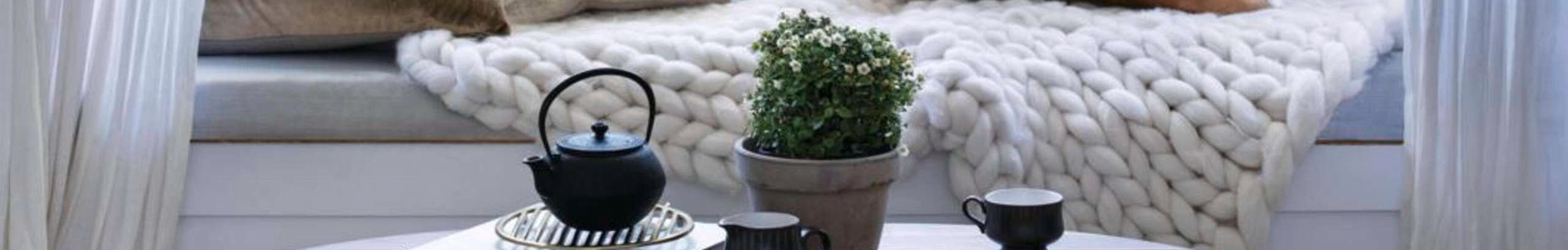 Bench seat with cushions and throws