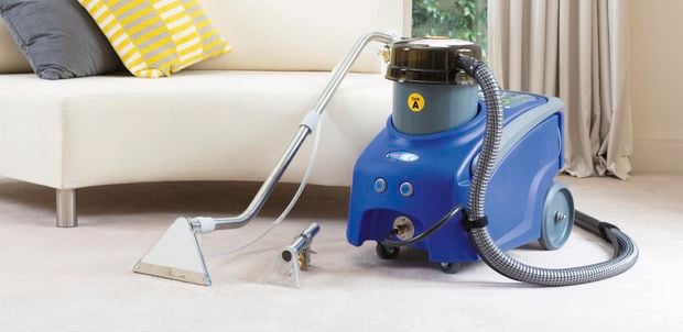 Britex carpet cleaner and a couch