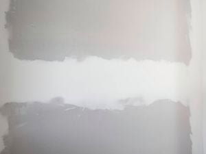 Newly installed plasterboard giving the wall a fresh look. 