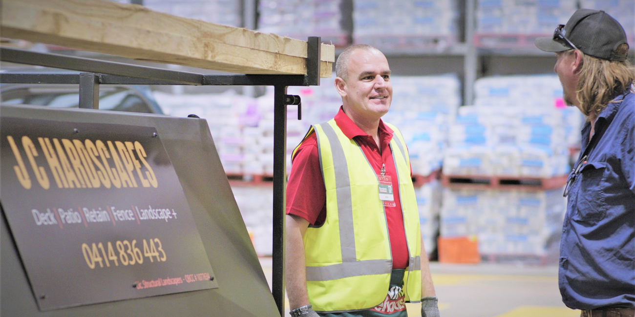 Bunnings team member chatting with customer