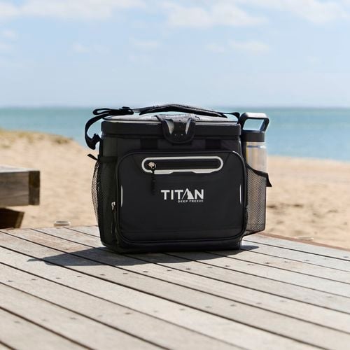 Take a
  Titan 16 Can Zipperless Hardbody Cooler to the beach