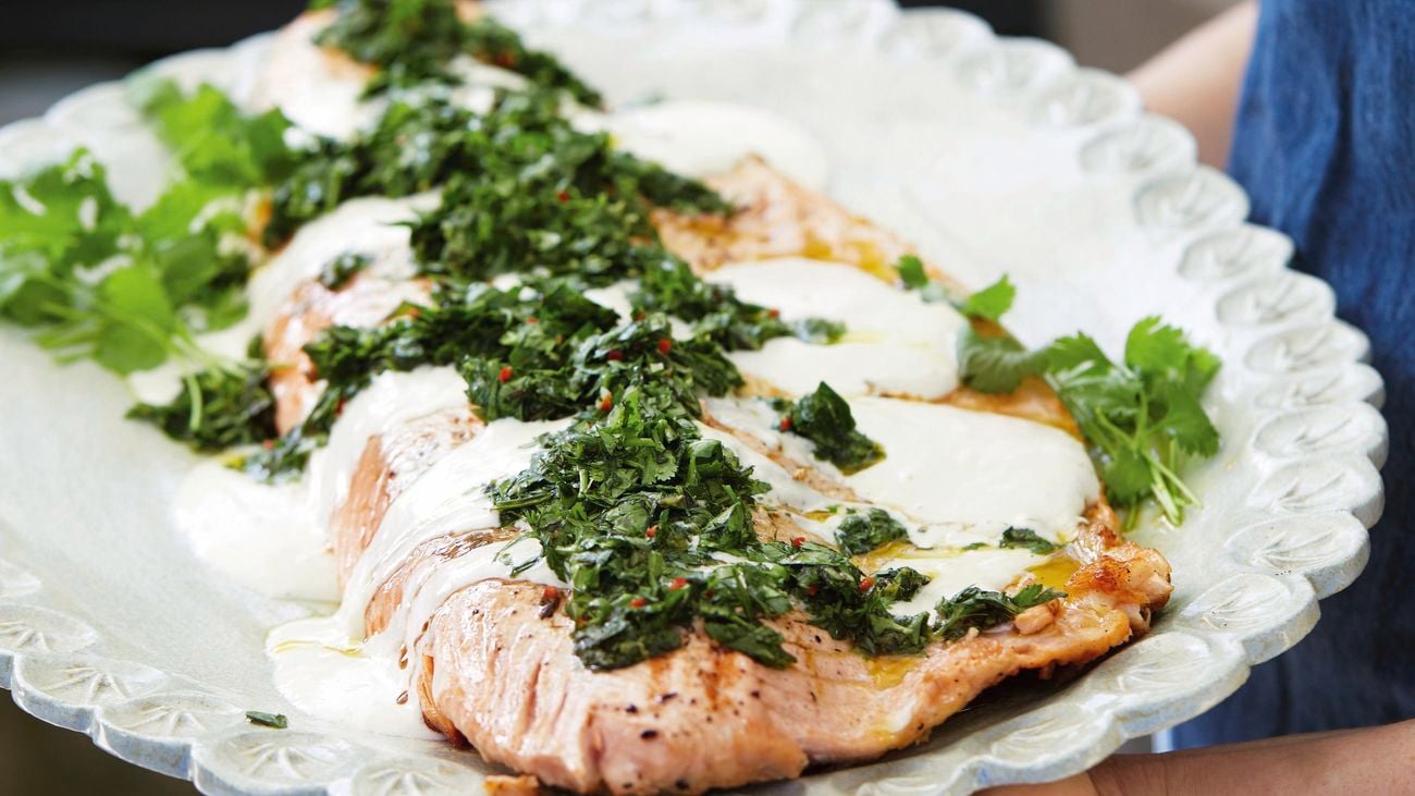 Barbecued salmon with tahini and chimchurri.