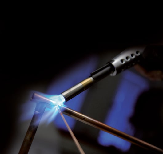 Closeup of a welding torch in action