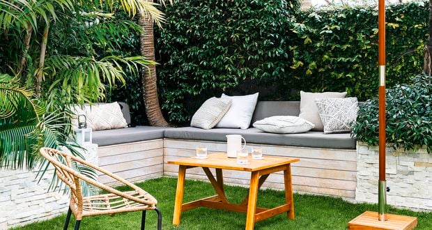 outdoor setting in backyard with white umbrella