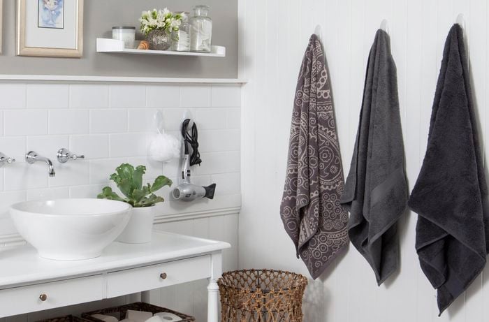 Towels hanging on a bathroom wall