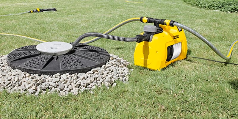 Pool pump on green lawn