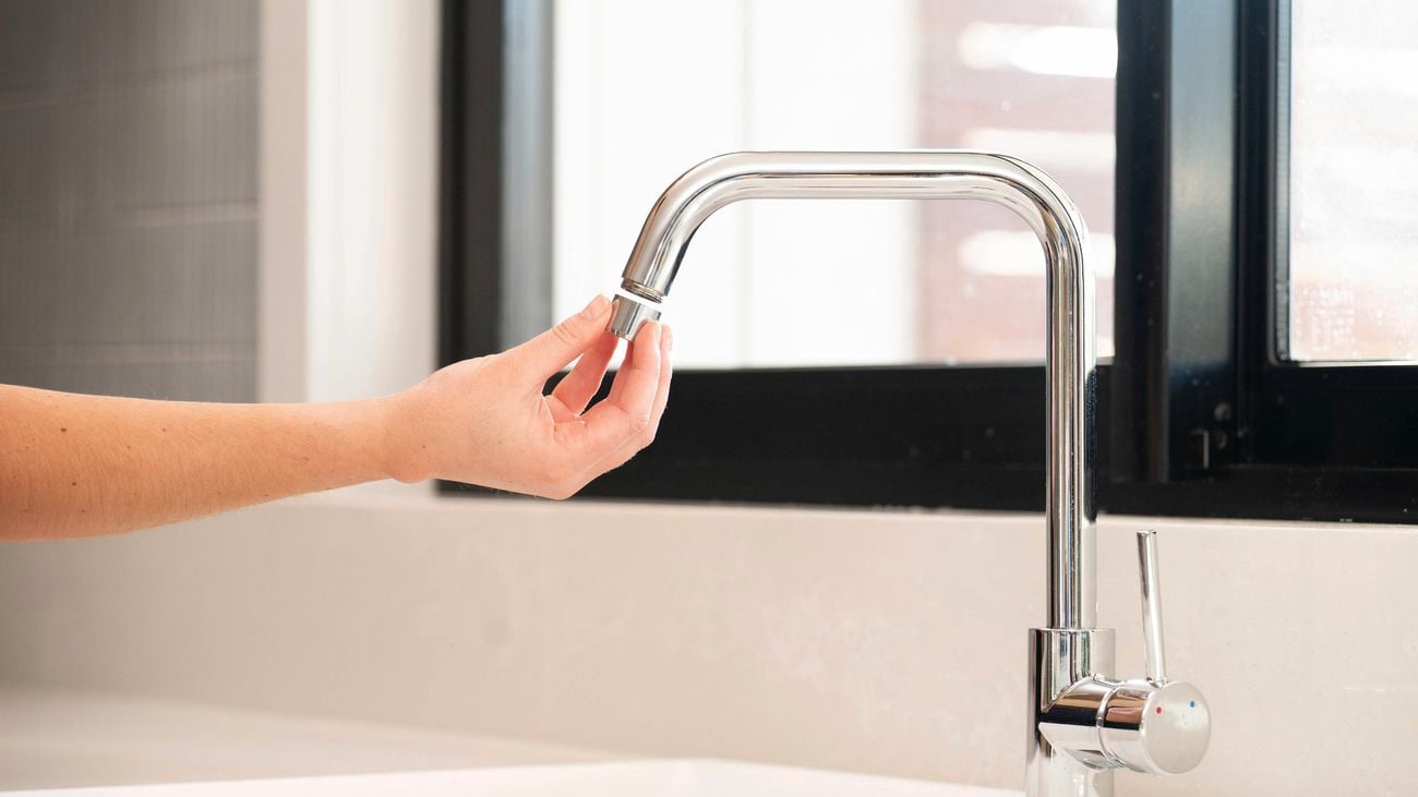 Remove the existing aerator by turning it anti-clockwise