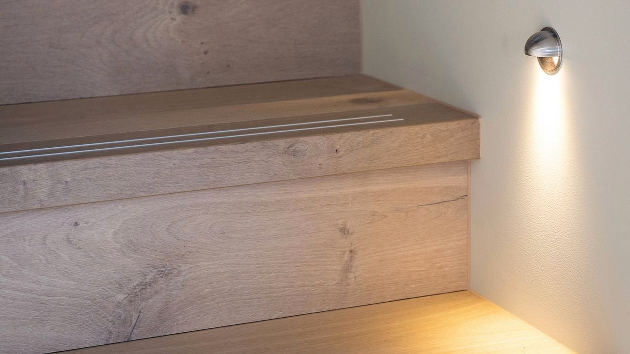 Stair lighting installed to improve visibility and safety as part of home modifications for accessibility.
