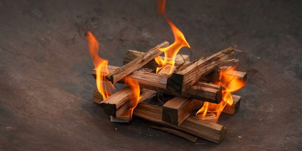 Freshly
  lit Samba Original Firelighters (3180289) in kindling stack in a firepit