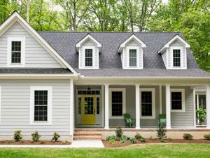 Close up of a house with a garden.