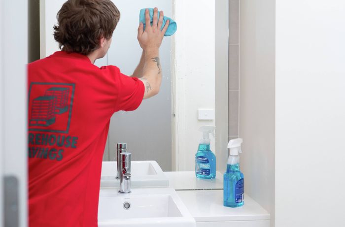 Clean mirror with glass cleaner for a streak-free finish​​
