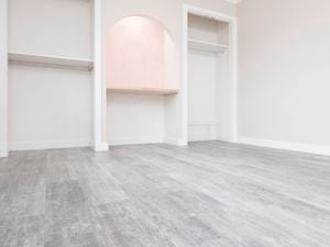 A beautiful room with perfectly laid planks.