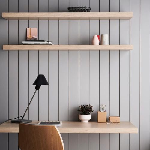 Floating timber look shelves, desk, chair and stationary. Batten 100 design in Dulux Warm Granite and Laminex in Natural Oak.