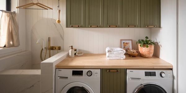 Laundry cabinetry with a pet bathing area