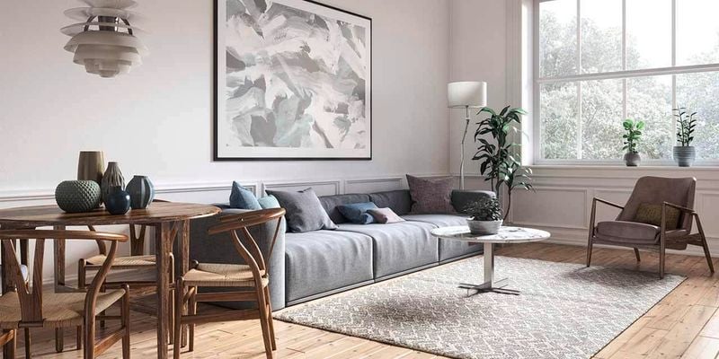 Furnished lounge room with a pale colour tone