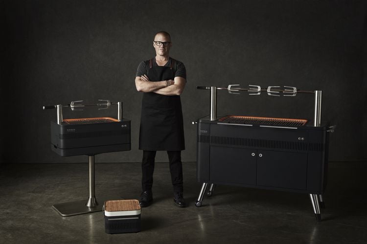 Heston Blumenthal standing with various cooking equipment