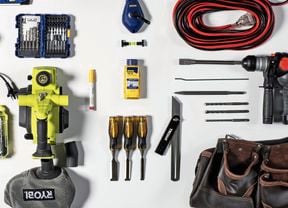 A range of D.I.Y. tools including extension cords, drills and tool belt.