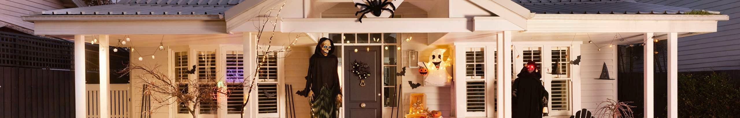 Halloween decorations at the front of a house.